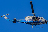 October 2025 police over Chicago, 2 cops on each side