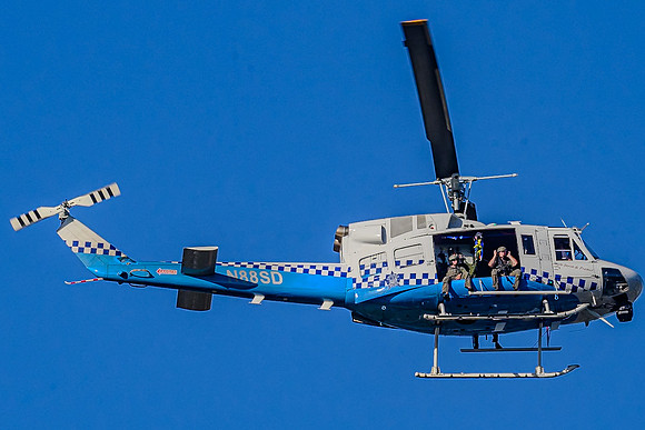 October 2025 police over Chicago, 2 cops on each side