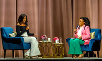 Michelle Obama with Phoebe Robinson at "Becoming" book tour Detroit 12/11/18