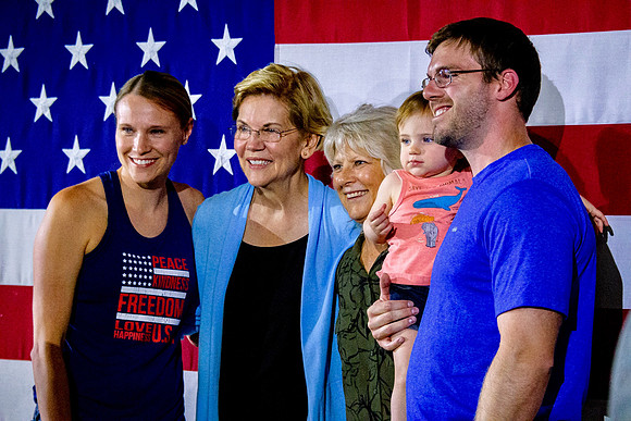Elizabeth Warren poses with attendees at Fort Dodge Iowa Town Hall