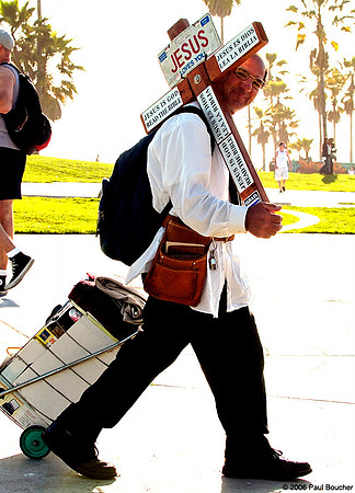 Man with Jesus sign