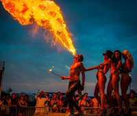 Fire eater performs at festival